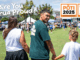 A man, woman, and child holding hands at a busy outdoor community event, with banners for “Local elections 2025,” “Pōti 2025,” and “Vote 2025” in the background. The phrase “Are You Porirua Proud?” is displayed, reflecting strong voter engagement across the city.
