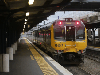 Metlink commuter train bound for Waikanae waiting at Wellington Station platform.