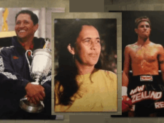 Three framed portraits of Porirua Hall of Fame inductees. From left: a smiling man holding a large trophy, a woman in a yellow top with long hair looking thoughtfully to the side, and a male boxer in red gloves and black shorts with "New Zealand" printed on the front.