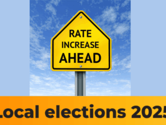 Yellow road sign reading “Rate Increase Ahead” under a blue sky, symbolising rising council rates ahead of the 2025 local elections.