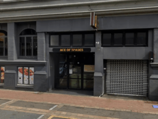 Police officers outside the Ace of Spades bar in Wellington, where a stabbing occurred during an early morning altercation.
