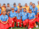 Members of the Porirua United Kirikiti Club pose with trophies after winning the inaugural Malaeola Women’s Kirikiti Tournament, the Wellington region’s first women’s-only kirikiti competition.
