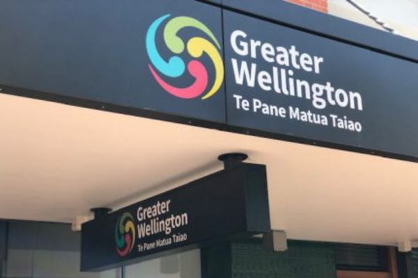 Greater Wellington Regional Council signage on a building exterior with logo and te reo Māori wording.