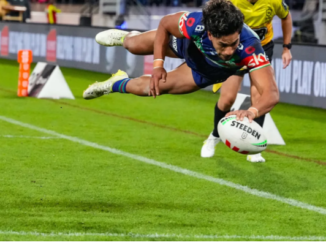 Alofiana Khan-Pereira dives low to ground the ball near the try line for the Warriors during their match against the Dolphins in Wellington.