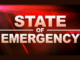 Red emergency-style graphic with bold white text reading “State of Emergency” against a dark red background with light streak effects.