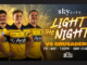 Promotional graphic for the Hurricanes’ “Light the Night” match against the Crusaders at Hnry Stadium on Friday, May 1 at 7.05pm, featuring three Hurricanes players in yellow jerseys standing in front of fireworks, with event branding and match details.