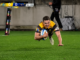 Hurricanes player dives over the try line with the ball during a Super Rugby Pacific match against the Highlanders.