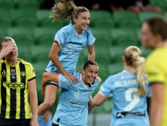 Melbourne City players celebrate during the Ninja A-League Women grand final against Wellington Phoenix at AAMI Park, while Phoenix players react after conceding a goal.