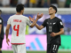 New Zealand’s Eli Just shakes hands with Iran’s Shoja Khalilzadeh during their 2-2 World Cup draw in Los Angeles.