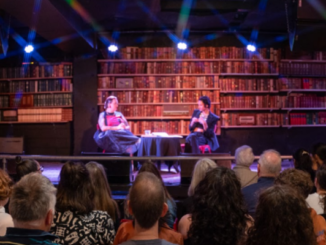 Two writers in conversation on stage before an audience at the Verb Readers & Writers Festival.