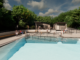 Artist’s impression of the redeveloped Khandallah Pool showing the proposed outdoor pool area, surrounding seating, accessible pathways and new facilities surrounded by greenery.