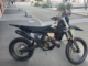 Black dirt bike parked on the Wellington waterfront after being recovered following an alleged joyride through the central city.