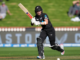White Ferns cricketer Amelia Kerr plays a shot while batting for New Zealand.