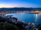 Wellington city and harbour at dusk, viewed from the hills above the central city.