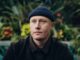 Wellington musician Louis Baker wearing a dark jacket and beanie.